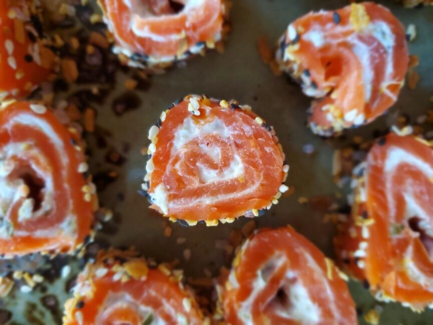 smoked lox with a caper cream cheese rolled up in the middle.