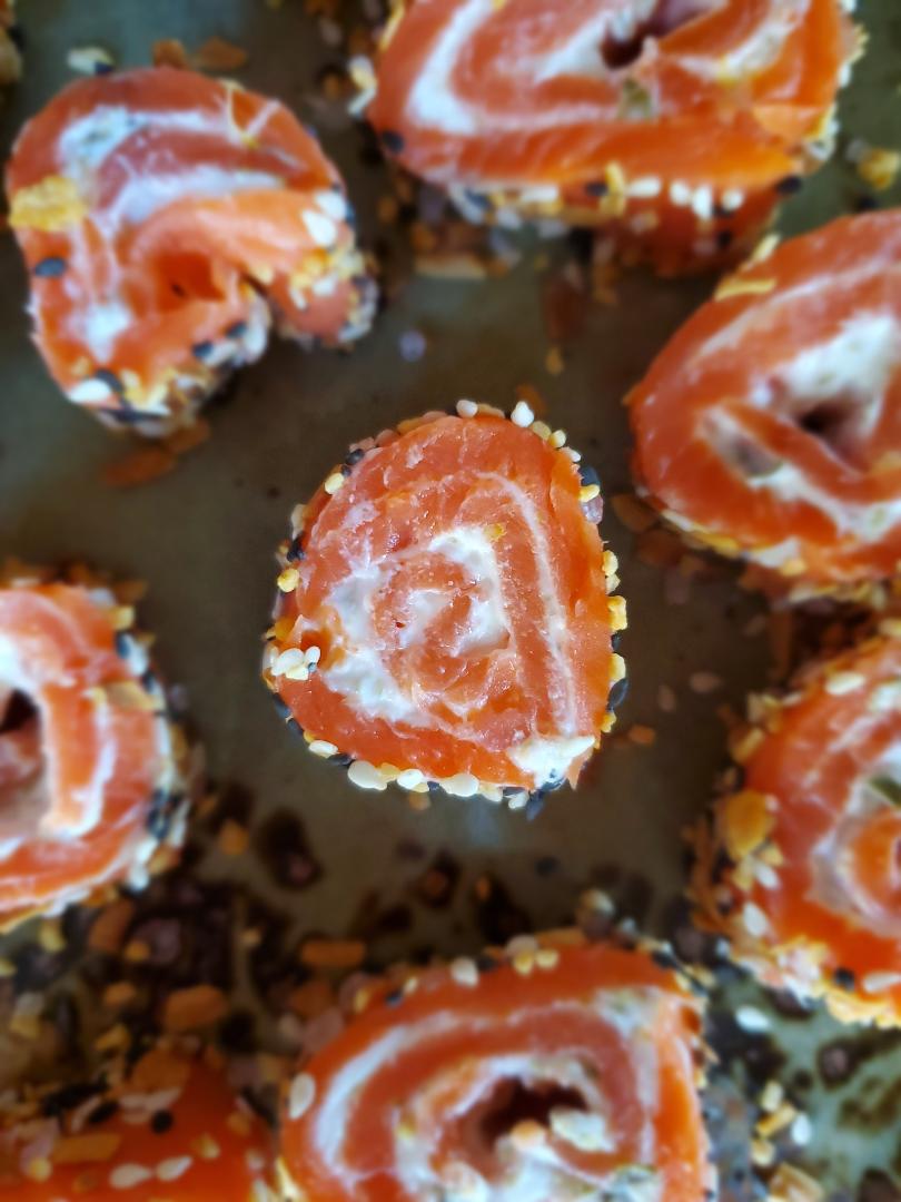 Smoked salmon stuffed with Greek yogurt and capers, rolled into a pinwheel and rolled in Everything Bagel Seasoning