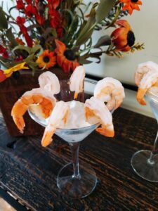 martini glass with shrimp on edge