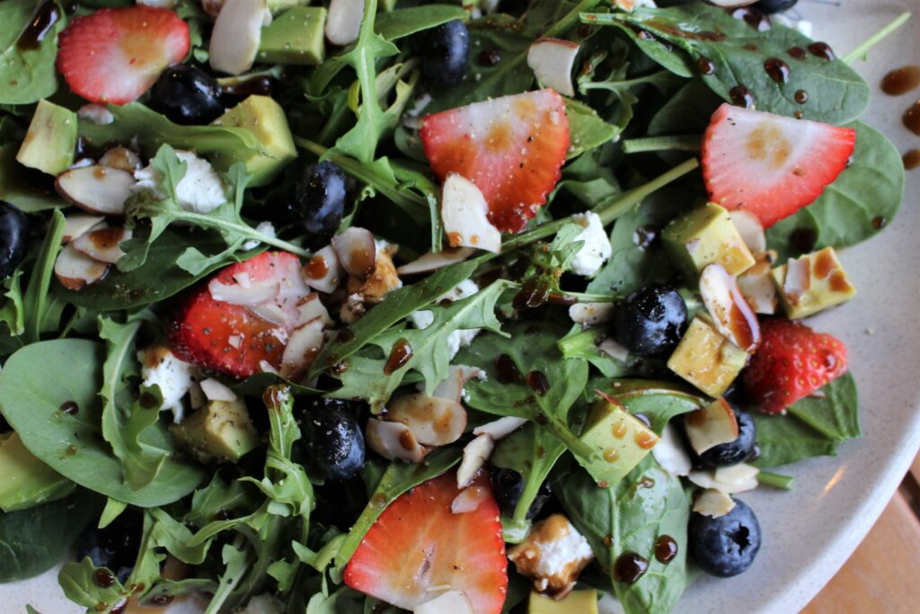 Berry avocado almond salad has all the textures and flavors. This is crunchy, creamy, tangy, and sweet.