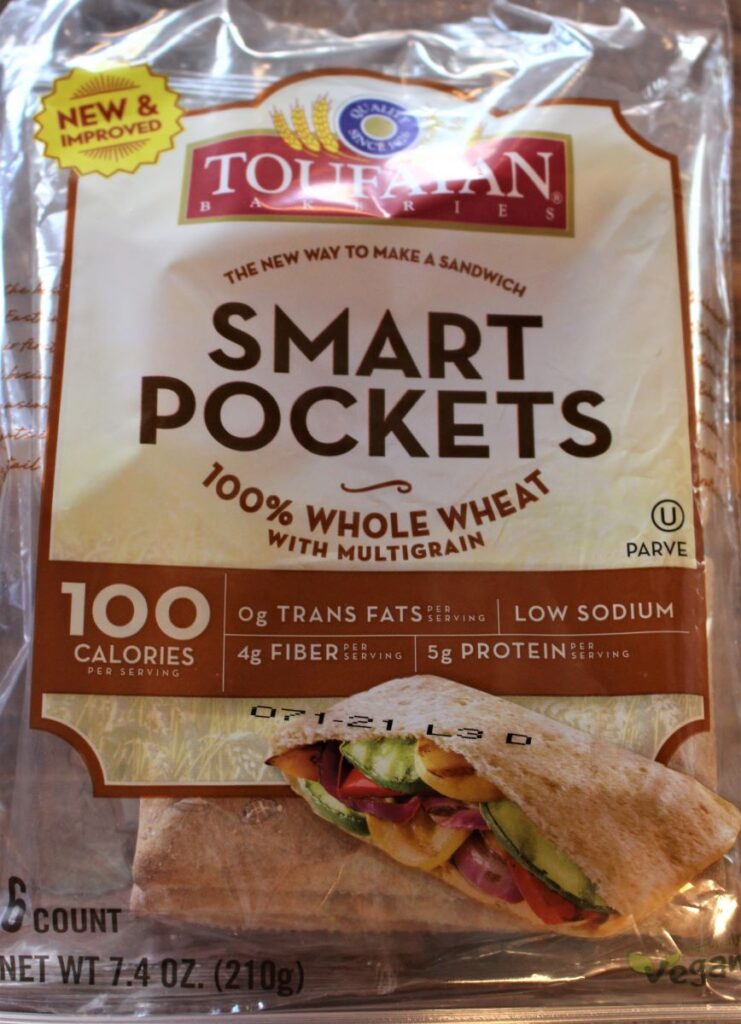Toufayan brand Smart Pockets are the pita pockets that my store carries. These are cut and ready to go.