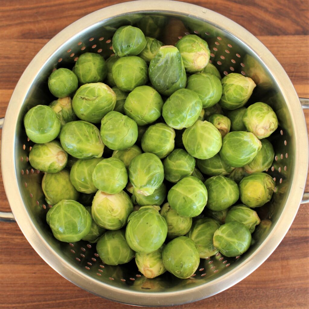 Small Brussels Sprouts rinsed in a colander