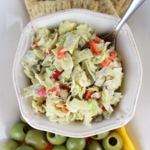 Chunky artichoke dip in a bowl.