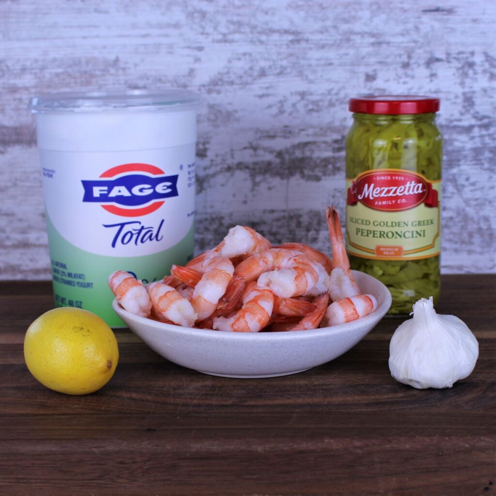 Only 5 ingredients in this easy appetizer: greek yogurt, peperoncini, lemon juice, garlic, and shrimp.