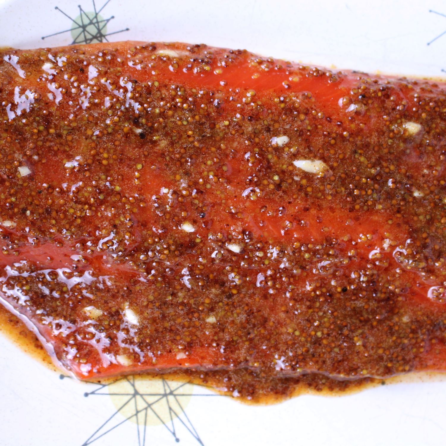 Wild caught salmon with a 4 ingredient glaze before grilling.