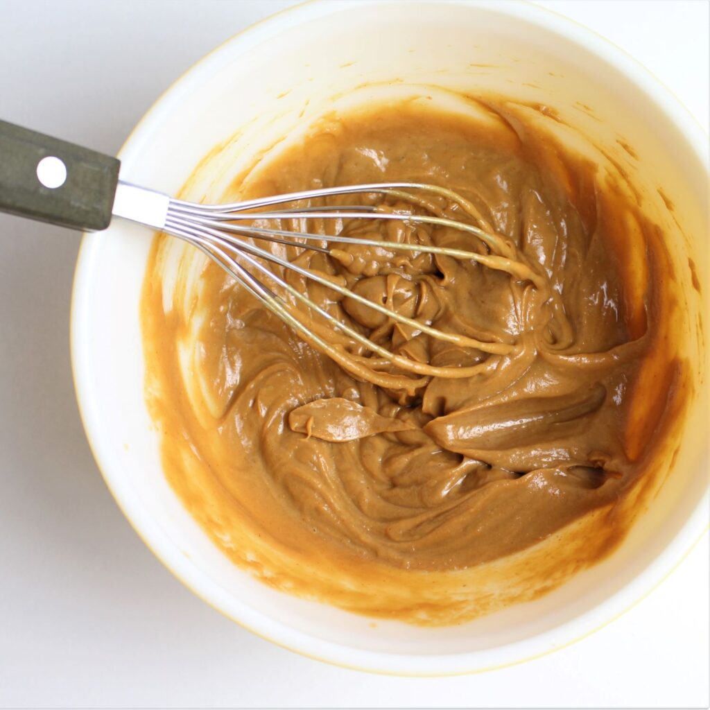 peanut sauce whisked up in a bowl