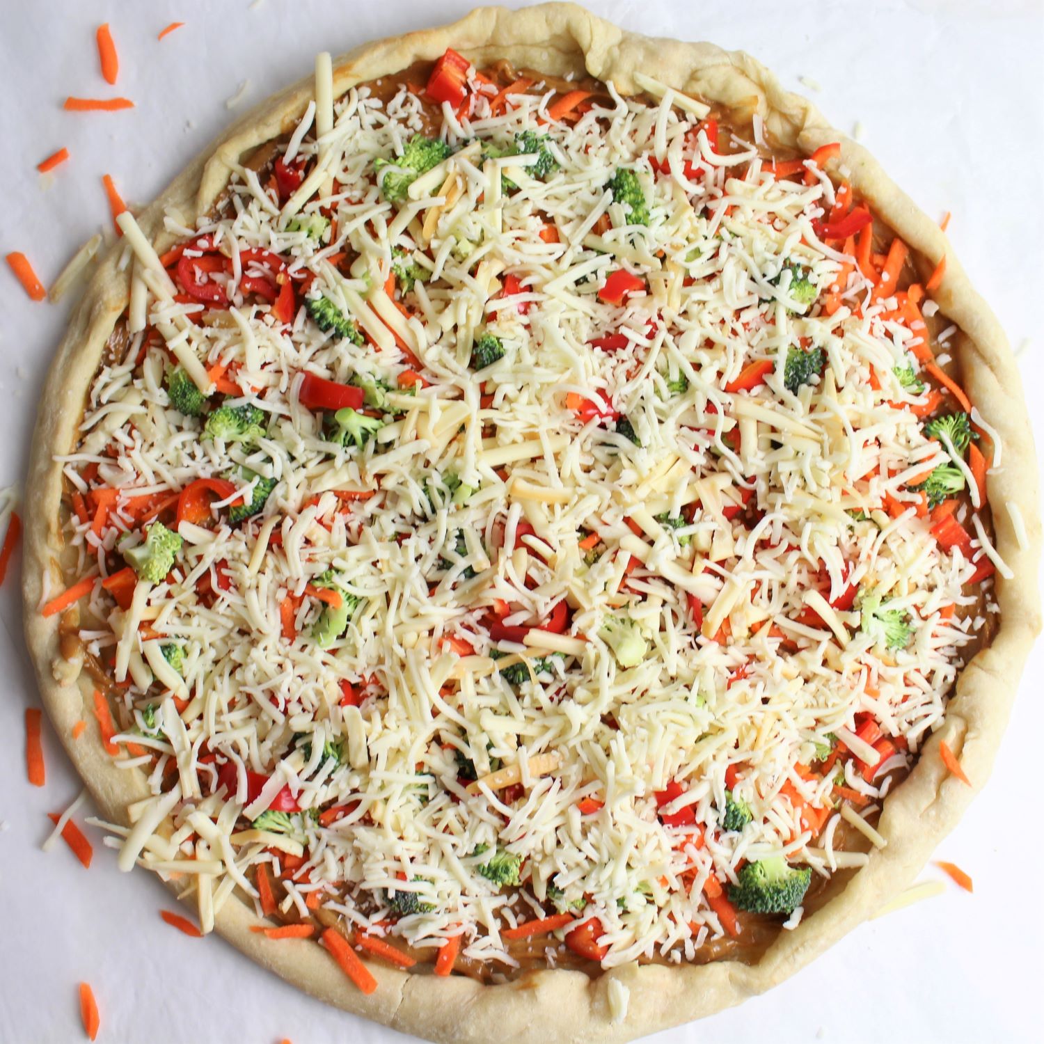 veggie pizza topped with cheese