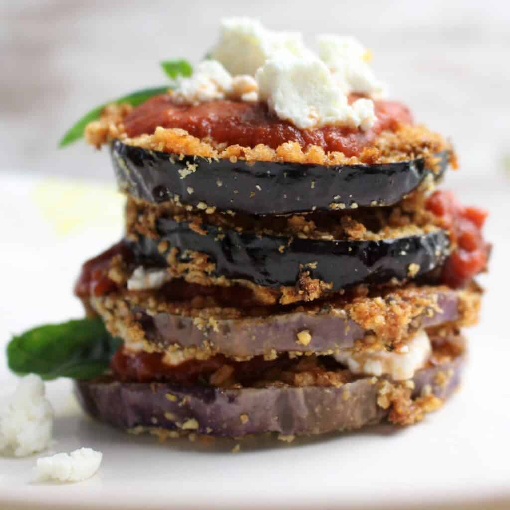 air fried eggplant stacked with pizza sauce and goat cheese