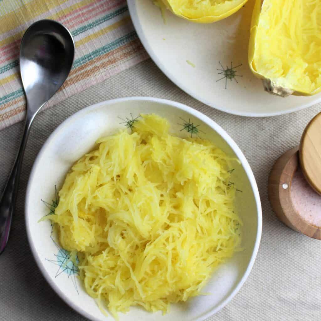 spaghetti squash shredded in a bowl ready to be gussied up.