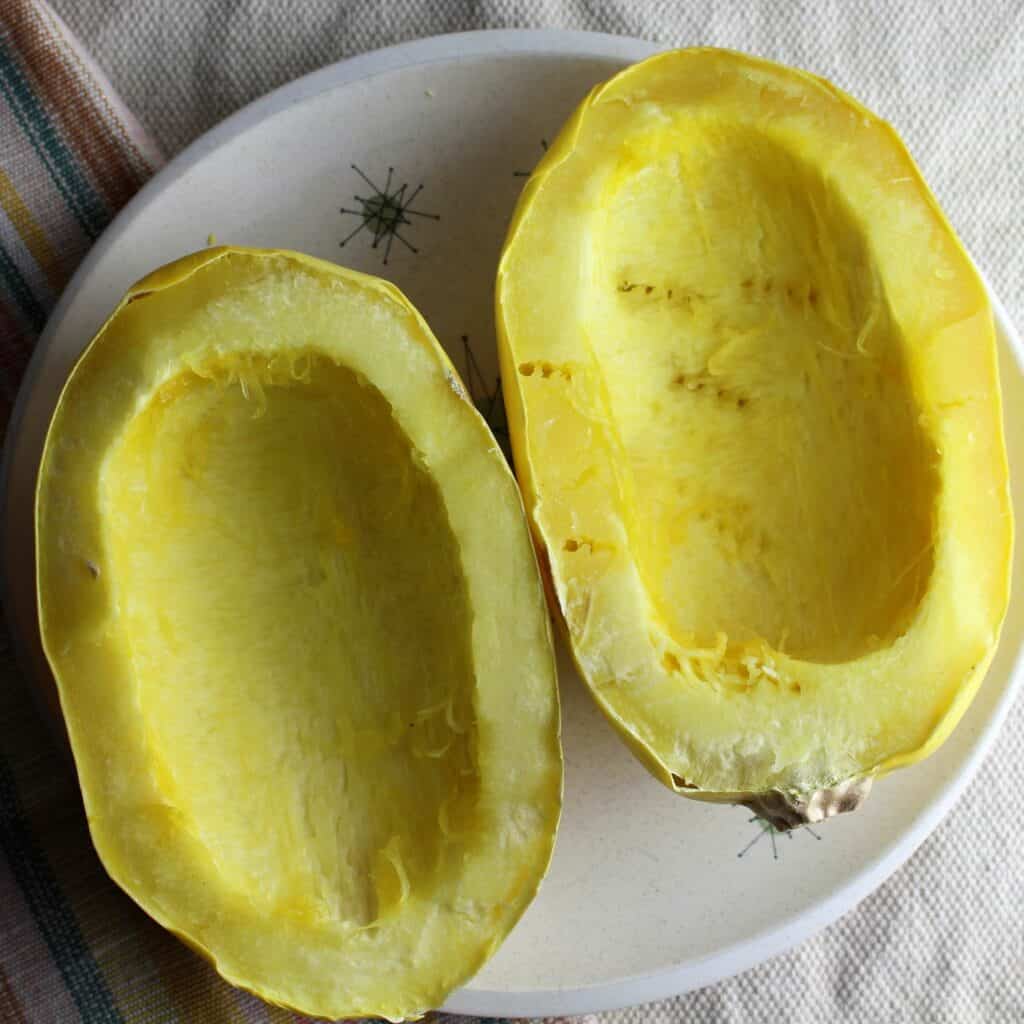 spaghetti squash cut in half cooked in microwave