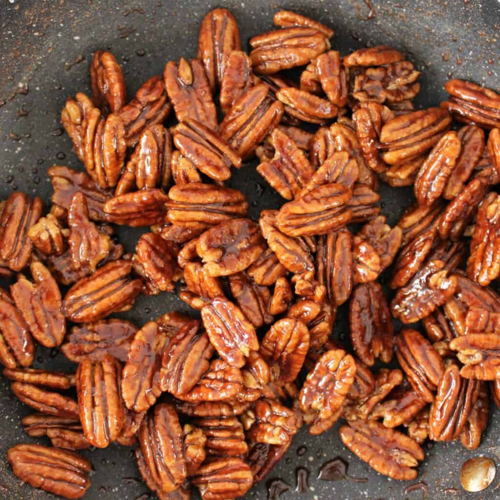 pecan halves in the pan almost ready