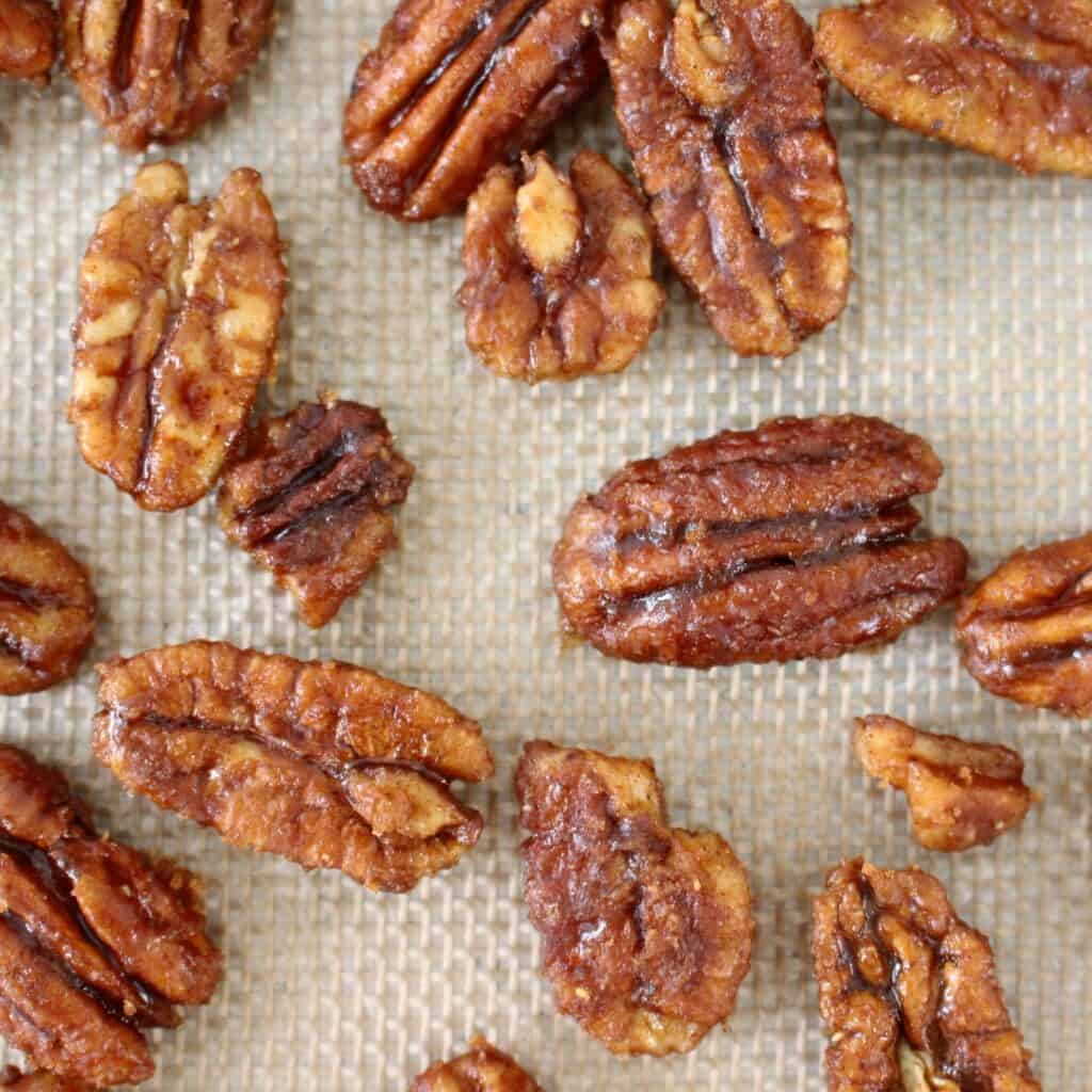 maple glazed pecans cooling on silpat mat