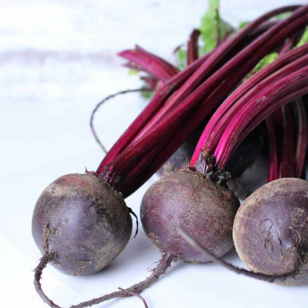 Red beets with the stems still attached