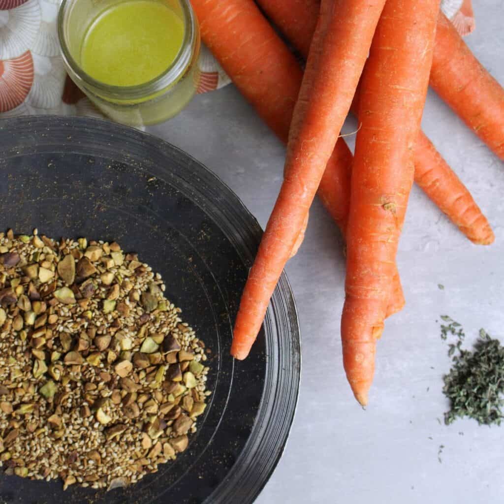 Carrots, dukkah, dressing, and thyme: all the ingredients needed for this carrot ribbon salad.
