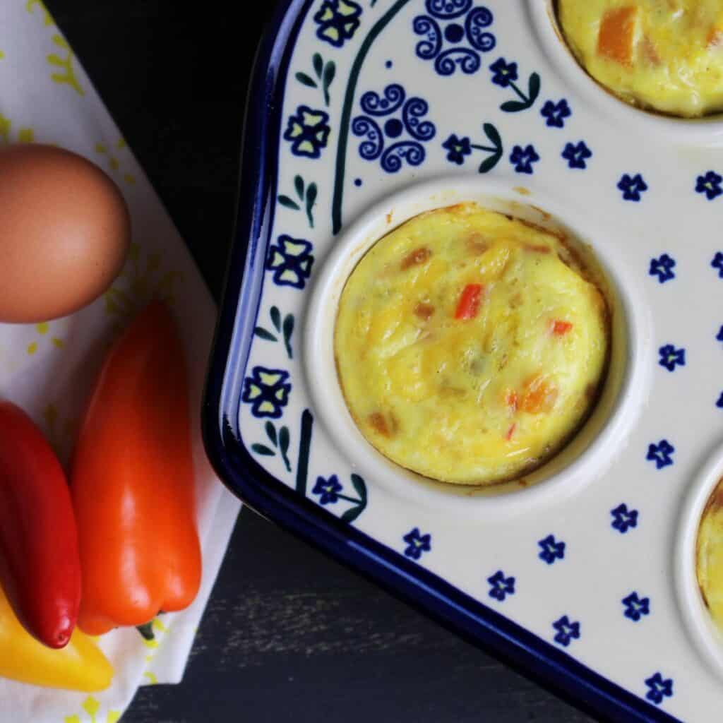 Green chili crustless quiche baked in muffin cups make for an easy grab and go breakfast.