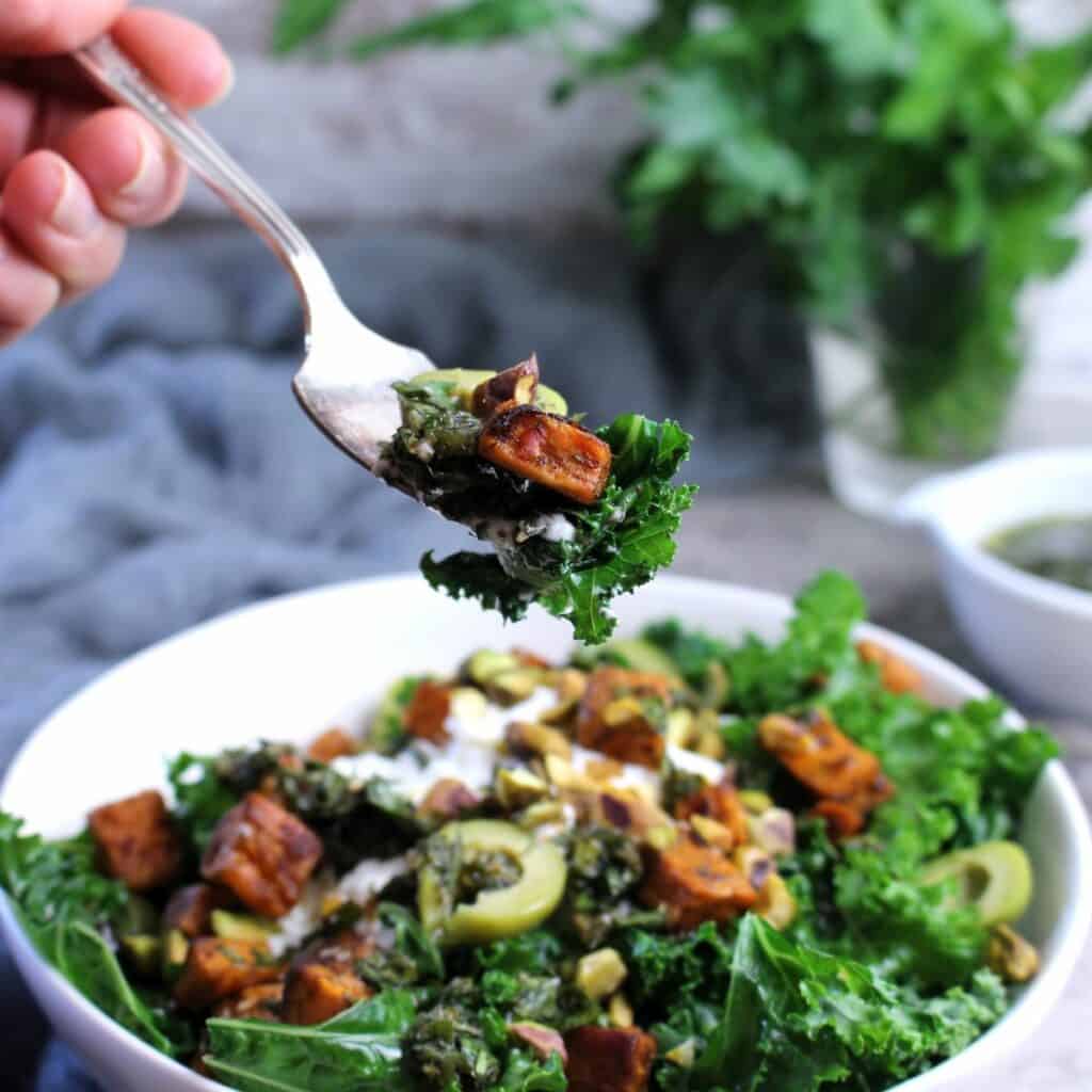 A fork full of this Nourish Bowl with Chimichurri dressing.