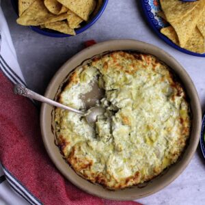 Artichoke Pesto Dip baked up and ready to eat.