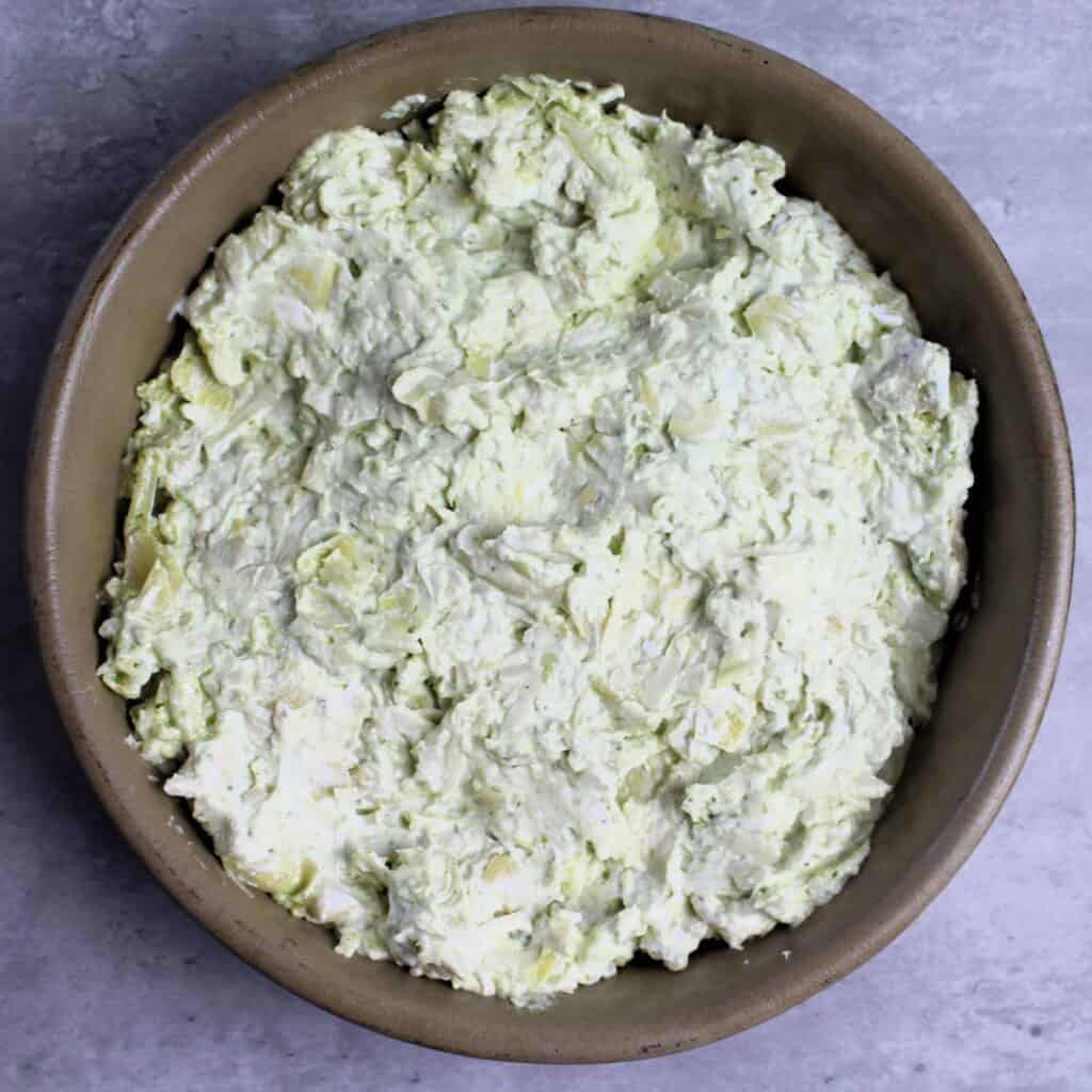 Raw dip in baking dish.