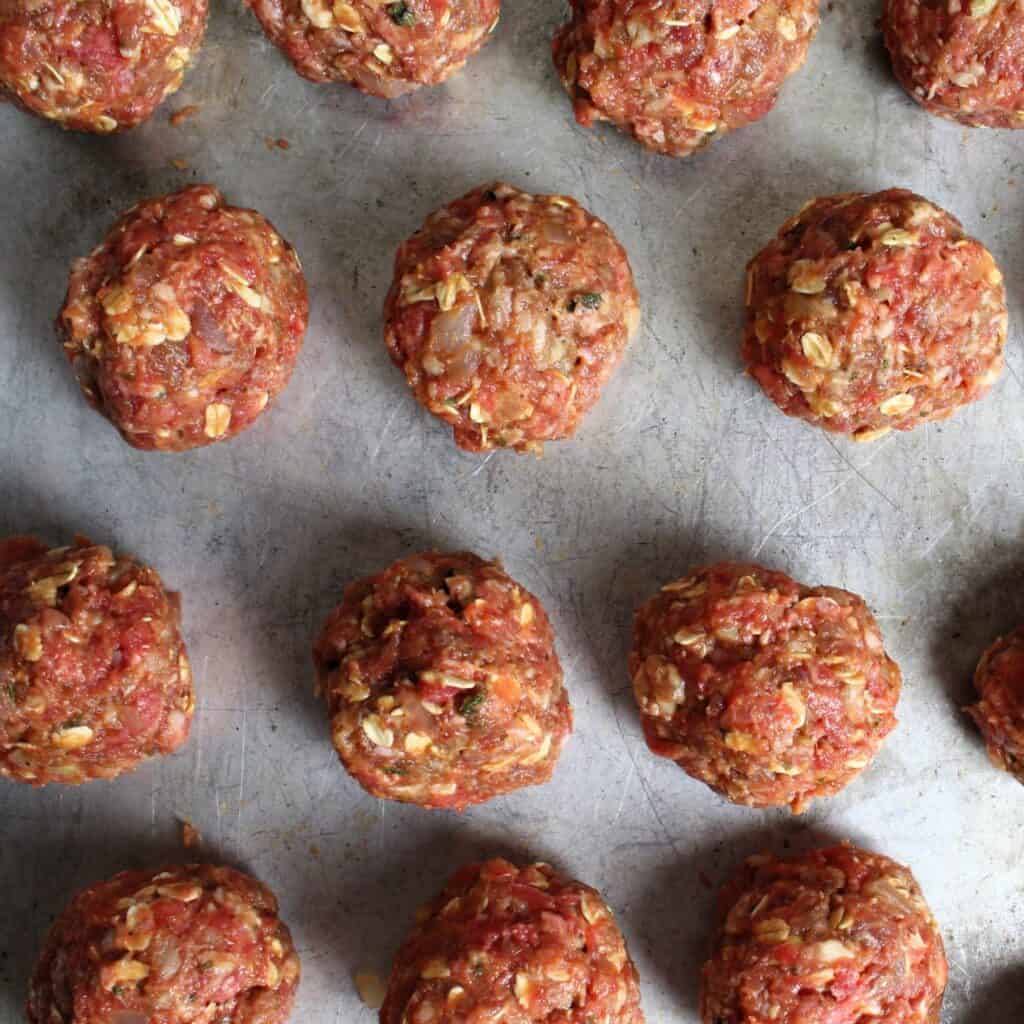 Meatloaf mix rolled into meatballs.