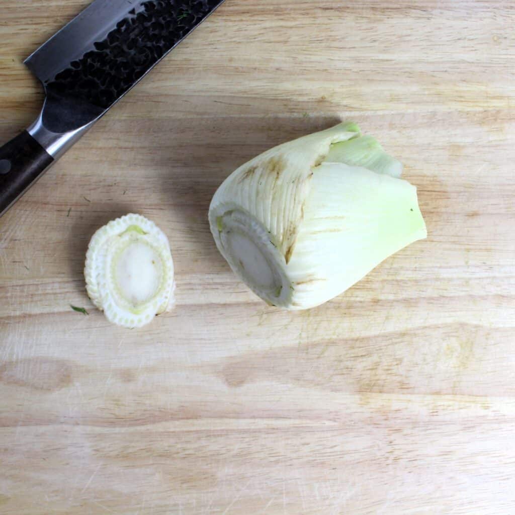 Bottom of fennel bulb cut off.