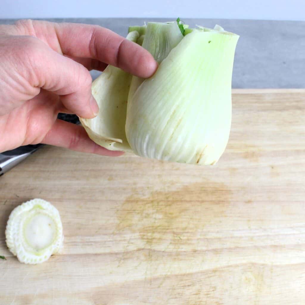 The outside layers of the fennel bulb are tough, remove a few.