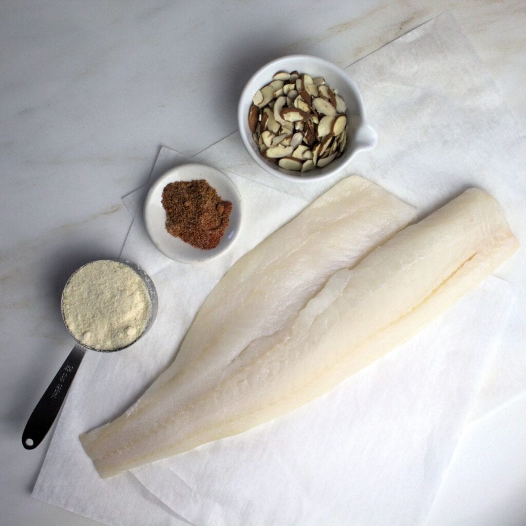 Ingredients for Almond Encrusted Cod are sliced almonds, spices, almond flour and cod.